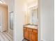 Bathroom with vanity and tub/shower combo at 18338 E Powers Pl, Centennial, CO 80015