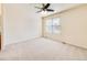 Bedroom featuring ceiling fan and window with natural light at 18338 E Powers Pl, Centennial, CO 80015
