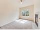 Bright and airy bedroom with large windows and a fireplace offers a comfortable retreat at 18338 E Powers Pl, Centennial, CO 80015