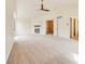 Spacious carpeted main bedroom featuring a fireplace and an en suite bathroom for added privacy at 18338 E Powers Pl, Centennial, CO 80015
