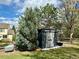 Well-maintained backyard with shed and trees, providing ample storage and a peaceful outdoor space at 18145 E Weaver Ave, Aurora, CO 80016