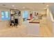 Basement gym area with work out equipment and a partial kitchen at 18145 E Weaver Ave, Aurora, CO 80016