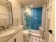 Modern bathroom featuring stylish tile work, glass shower, and sleek fixtures for a spa-like experience at 18145 E Weaver Ave, Aurora, CO 80016
