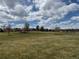 Expansive community green space perfect for picnics, recreation, and enjoying the outdoors at 18145 E Weaver Ave, Aurora, CO 80016