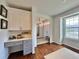 Open-concept area showcasing the foyer, a butler's pantry, and desk area, providing a functional space at 18145 E Weaver Ave, Aurora, CO 80016