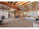 Unfinished basement with high ceilings and roughed in plumbing at 20162 E 53Rd Pl, Denver, CO 80249
