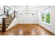 Bright dining area with hardwood floors and staircase at 1934 S Sherman St, Denver, CO 80210