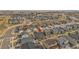 High angle view of a neighborhood with a mix of single-Gathering homes, showcasing the roof lines at 10525 Akron St, Commerce City, CO 80640