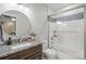 Clean bathroom with granite countertop vanity and shower and tub combo at 6331 County Road 32, Platteville, CO 80651