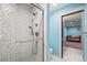 Modern bathroom with a luxurious glass-enclosed shower featuring stylish tile work and sleek fixtures at 6331 County Road 32, Platteville, CO 80651
