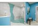 Modern bathroom with a glass shower, turquoise accents, and clean finishes at 6331 County Road 32, Platteville, CO 80651