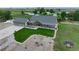 A beautiful exterior view shows a well-maintained yard and lovely stonework detail at 6331 County Road 32, Platteville, CO 80651