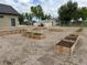 Several garden boxes filled with produce near the home enhance the feeling of fresh living at 6331 County Road 32, Platteville, CO 80651