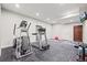 Finished basement space with exercise equipment, offering a convenient area for workouts at 6331 County Road 32, Platteville, CO 80651