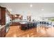This well-appointed kitchen has a large island and flows seamlessly into the dining area at 6331 County Road 32, Platteville, CO 80651