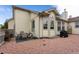 Outdoor patio area features a dining set, grill, and rock landscaping, perfect for relaxing and entertaining at 15653 Split Creek Dr, Monument, CO 80132