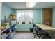 Functional basement office with a window, desk, and shelving for an organized workspace at 15653 Split Creek Dr, Monument, CO 80132
