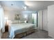 Cozy bedroom with a comfortable bed, soft carpet and natural light through the window at 15653 Split Creek Dr, Monument, CO 80132