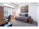Comfortable bedroom featuring natural light and neutral colors, a serene retreat for relaxation and rest at 15653 Split Creek Dr, Monument, CO 80132