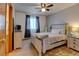 Cozy bedroom featuring soft decor, carpet flooring, and bright natural light at 12135 Elizabeth St, Thornton, CO 80241