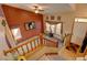 Upstairs view of the living room with carpet flooring and natural light at 12135 Elizabeth St, Thornton, CO 80241