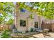 Cozy backyard with a small patio and privacy fence at 2035 Overland Dr, Brighton, CO 80601