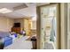 Basement with living area and open doorway to a full bathroom for added convenience at 2035 Overland Dr, Brighton, CO 80601