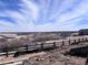 Expansive rural view from lot, showcasing distant horizon and neighboring homes at 4284 Ridgewalk Pt, Castle Rock, CO 80108
