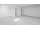Open basement layout with clean, neutral carpeting, ideal for creating a versatile living area or recreational space at 11 Canongate Ln, Highlands Ranch, CO 80130