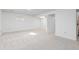 Spacious basement with neutral carpet and bright white walls, ready for customization and plenty of natural light at 11 Canongate Ln, Highlands Ranch, CO 80130