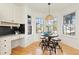 Charming breakfast nook with large windows and a cozy table setup, perfect for morning meals at 11 Canongate Ln, Highlands Ranch, CO 80130