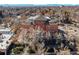 An aerial view of a large brick building and the surrounding neighborhood at 2351 Federal Blvd # 102, Denver, CO 80211