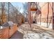 Grilling area on the patio surrounded by brick walls and a chain link fence at 2351 Federal Blvd # 102, Denver, CO 80211