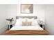Inviting bedroom with cozy bedding, minimalist decor, and stylish bedside tables at 2351 Federal Blvd # 102, Denver, CO 80211