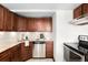 Well-equipped kitchen featuring modern stainless steel appliances, and stylish cabinetry at 2351 Federal Blvd # 102, Denver, CO 80211
