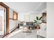 Comfortable living room with a soft rug, comfortable seating, and natural light at 2351 Federal Blvd # 102, Denver, CO 80211