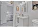 Stylish bathroom boasts a modern vanity, sleek fixtures, and decorative accents at 4726 S Taft St, Morrison, CO 80465