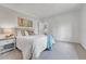 Cozy bedroom with soft carpet, neutral walls, and ample natural light at 4726 S Taft St, Morrison, CO 80465