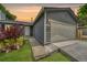 Charming home featuring a two-car garage, well-kept lawn and beautiful landscape at 4726 S Taft St, Morrison, CO 80465