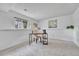 Bright office space featuring neutral walls, soft carpet and a large window at 4726 S Taft St, Morrison, CO 80465