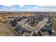An aerial view showcases the neighborhood's layout and community feel at 2405 Horse Shoe Cir, Fort Lupton, CO 80621