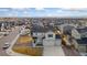 Charming two-story home with a two-car garage and beautifully landscaped front yard at 2405 Horse Shoe Cir, Fort Lupton, CO 80621