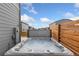 Relaxing hot tub nestled in a private corner of the backyard at 2405 Horse Shoe Cir, Fort Lupton, CO 80621