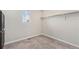 Spacious walk-in closet with ample storage space and natural light at 2405 Horse Shoe Cir, Fort Lupton, CO 80621