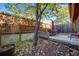The outdoor deck is perfect for entertaining or relaxing in this fenced backyard at 1810 Youngfield Ct # A, Golden, CO 80401