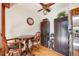 Charming breakfast nook with wooden table and chairs, built-in cabinets and plenty of natural light at 1810 Youngfield Ct # A, Golden, CO 80401
