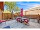 Outdoor patio with a dining table and chairs set under an umbrella, perfect for entertaining at 1810 Youngfield Ct # A, Golden, CO 80401