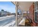 Front porch with bench and view of the neighborhood at 11080 W Walker Dr, Littleton, CO 80127