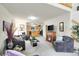 Inviting living room complete with a fireplace and open access to the adjacent kitchen area at 2616 E Egbert St, Brighton, CO 80601