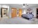 Large main bedroom with carpet, natural lighting and traditional interior design at 2616 E Egbert St, Brighton, CO 80601